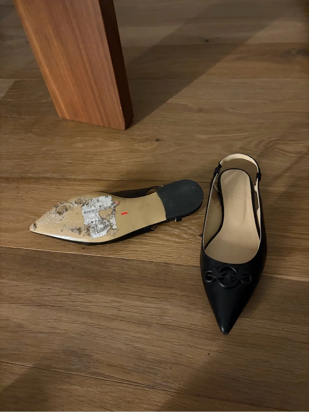 Black Pointed Slingback Flats with Decorative Logo Accent